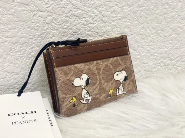 NWT COACH x Peanuts Mini Skinny ID Case CBT14 in Signature Canvas with Snoopy Print