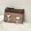NWT COACH x Peanuts Mini Skinny ID Case CBT14 in Signature Canvas with Snoopy Print