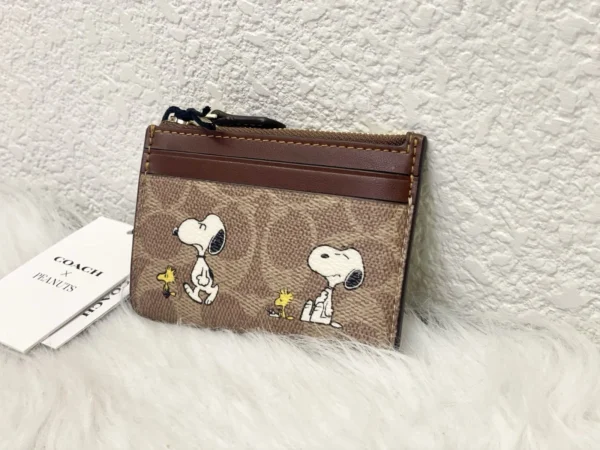 NWT COACH x Peanuts Mini Skinny ID Case CBT14 in Signature Canvas with Snoopy Print