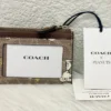 NWT COACH x Peanuts Mini Skinny ID Case CBT14 in Signature Canvas with Snoopy Print