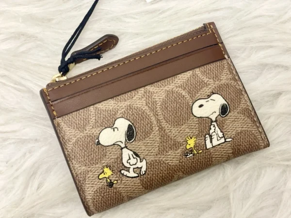 NWT COACH x Peanuts Mini Skinny ID Case CBT14 in Signature Canvas with Snoopy Print
