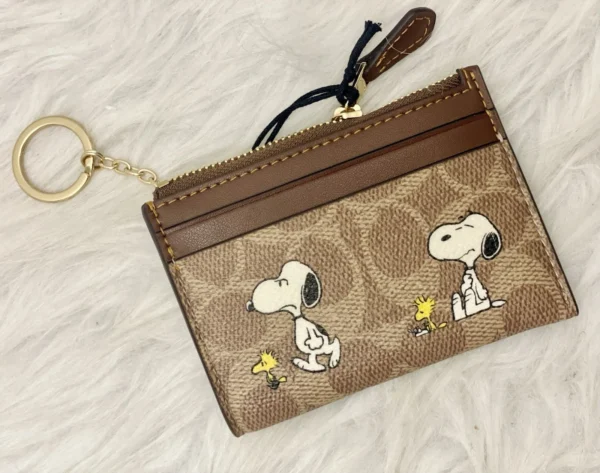 NWT COACH x Peanuts Mini Skinny ID Case CBT14 in Signature Canvas with Snoopy Print