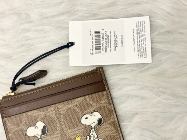 NWT COACH x Peanuts Mini Skinny ID Case CBT14 in Signature Canvas with Snoopy Print