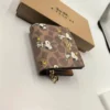 NWT COACH x Peanuts Snap Wallet CBN32 in Signature Canvas with Snoopy Print