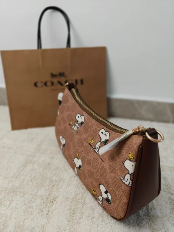 COACH x Peanuts Teri Shoulder Bag CBJ88 in Tan Brown Signature Canvas with Snoopy Print COACH x Peanuts Teri Shoulder Bag CBJ88 in Tan Brown Signature Canvas with Snoopy Print