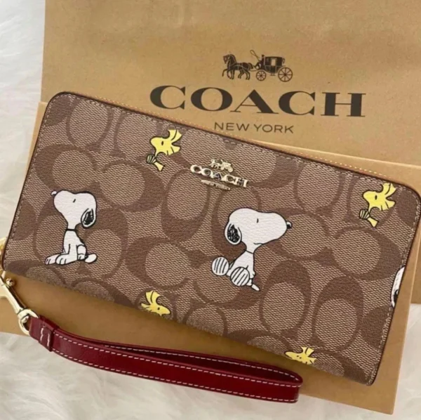 COACH x Peanuts CE705 Long Zip Around Wallet in Khaki Signature Canvas with Snoopy and Woodstock