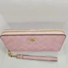 COACH CW778 Signature Canvas Wallet with Strap in Pink Zip Around